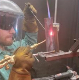 A student welding.